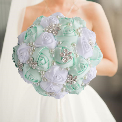 Kollased kuningsinised pulmakimbud kristallist pruudikimpudega pruutneitsi kunstsatiinroosid pruutlilled