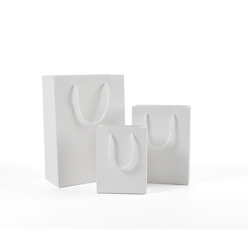 Baltas kartoninis dovanų maišelis Popierinių drabužių paketas Gimtadienio festivalio Kalėdų vakarėlio dovanų maišelis Įvairių dydžių 40x10x30cm