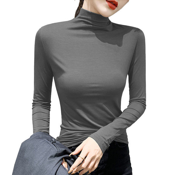 O bluză de damă modernă cu mânecă lungă și guler polo potrivită pentru viața de zi cu zi