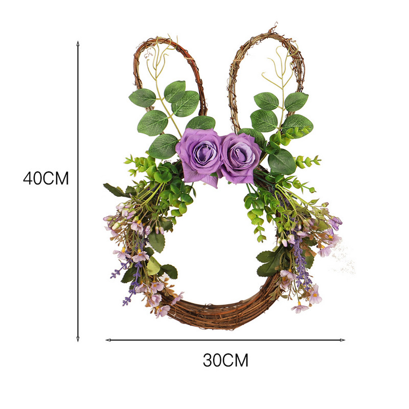 Lihavõttepärja kaunistus lilla roosi ja roheliste lehtedega rotangist pärg esiukse seina akna pühadekaunistuseks