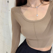 Naiste vabaaja lühike ovaalse dekoltee ja pikkade varrukatega pluus