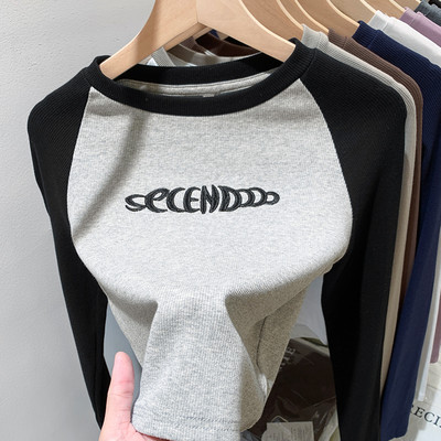 Uue mudeli naiste pluus ovaalse kaelusega ja kirjaga