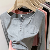 Tasku ja nööpidega vabaaja naiste pluus