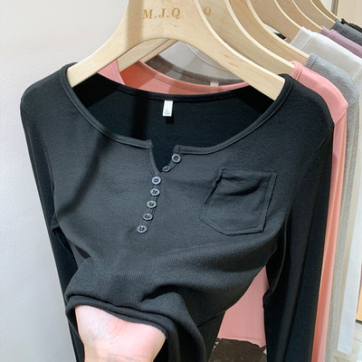 Tasku ja nööpidega vabaaja naiste pluus