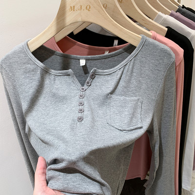 Tasku ja nööpidega vabaaja naiste pluus