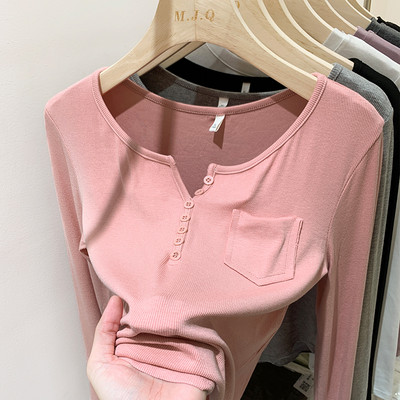 Tasku ja nööpidega vabaaja naiste pluus