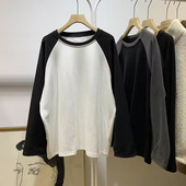 Bluză de damă cu mânecă lungă și decolteu oval cu model larg