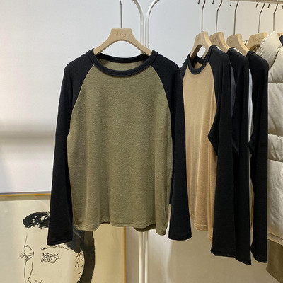 Bluză de damă cu mânecă lungă și decolteu oval cu model larg