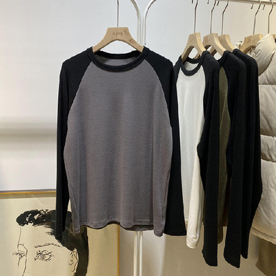 Bluză de damă cu mânecă lungă și decolteu oval cu model larg