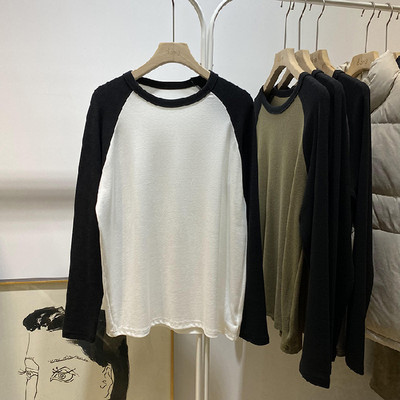 Bluză de damă cu mânecă lungă și decolteu oval cu model larg