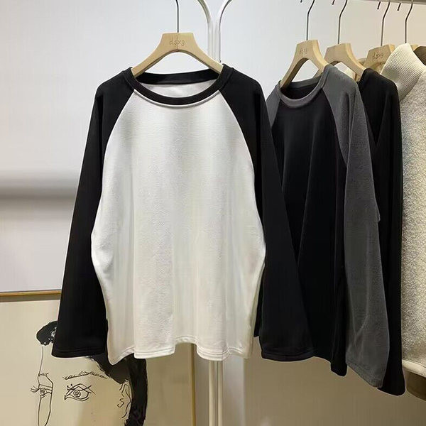 Bluză de damă cu mânecă lungă și decolteu oval cu model larg