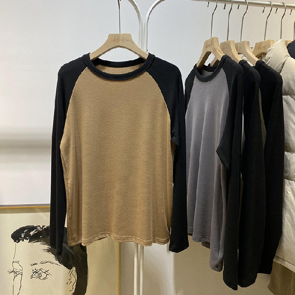 Bluză de damă cu mânecă lungă și decolteu oval cu model larg