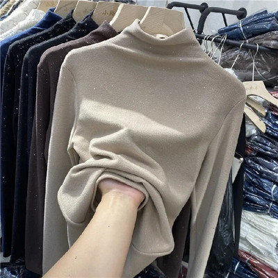 Bluză de damă modernă cu guler polo și elemente strălucitoare