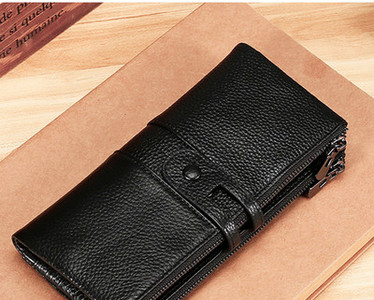 Δερμάτινο ανδρικό πορτοφόλι με δύο θήκες που κλείνει με φερμουάρ και κουμπί