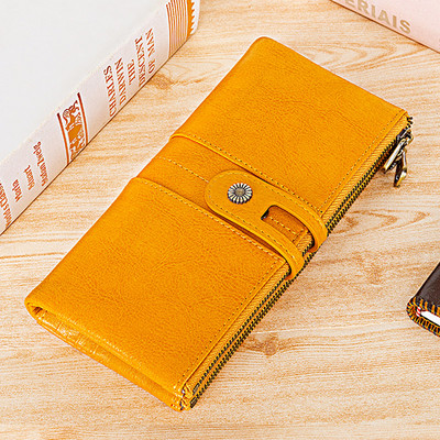 Δερμάτινο ανδρικό πορτοφόλι με δύο θήκες που κλείνει με φερμουάρ και κουμπί