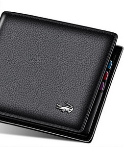 Δερμάτινο ανδρικό πορτοφόλι με μεταλλική διακόσμηση