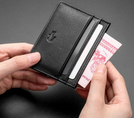 Portofel barbatesc din piele cu compartimente pentru bancnote si carduri de credit