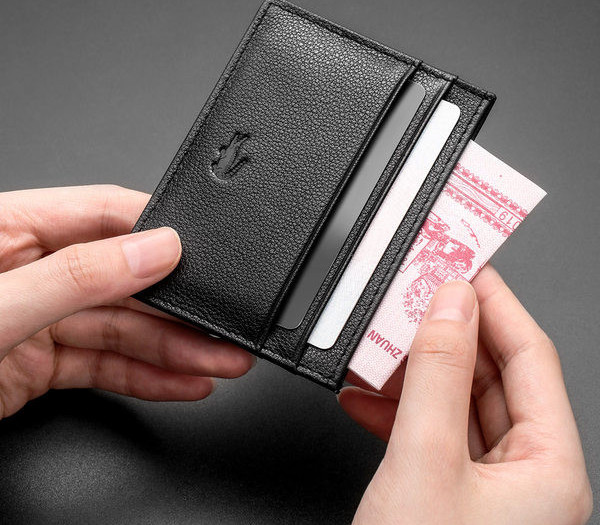 Portofel barbatesc din piele cu compartimente pentru bancnote si carduri de credit