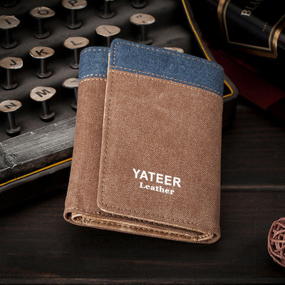 Κομψό ανδρικό πορτοφόλι από ύφασμα με επιγραφή και εφαρμογή