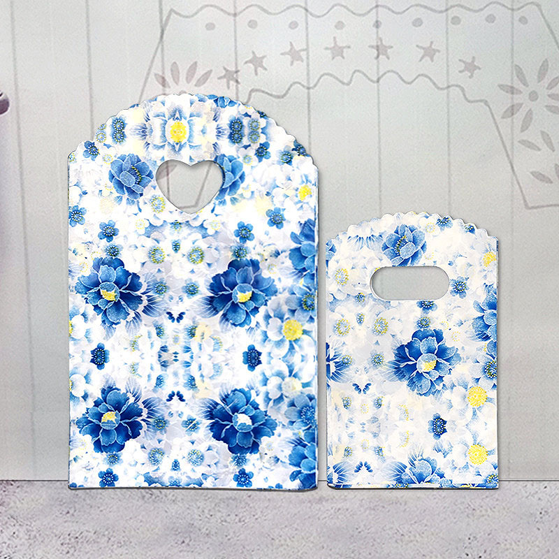 50 τμχ/παρτίδα Διάφορα μοτίβα κοσμήματα Πλαστική τσάντα σε σχήμα καρδιάς Οβάλ λαβές Μίνι τσάντα συσκευασίας δώρου Κατάστημα μικρές τσάντες αγορών