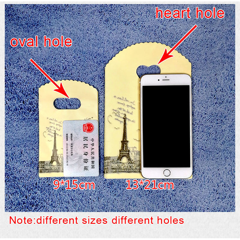 50 τμχ/παρτίδα Διάφορα μοτίβα κοσμήματα Πλαστική τσάντα σε σχήμα καρδιάς Οβάλ λαβές Μίνι τσάντα συσκευασίας δώρου Κατάστημα μικρές τσάντες αγορών