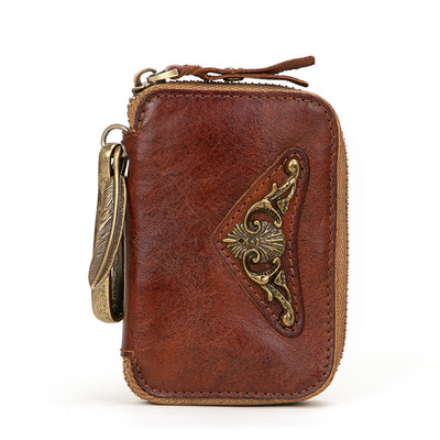 Portofel modern din piele cu fermoar și element metalic