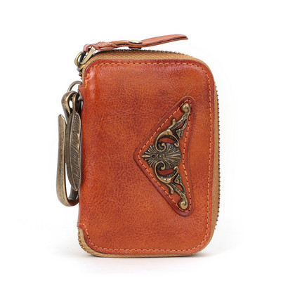 Portofel modern din piele cu fermoar și element metalic