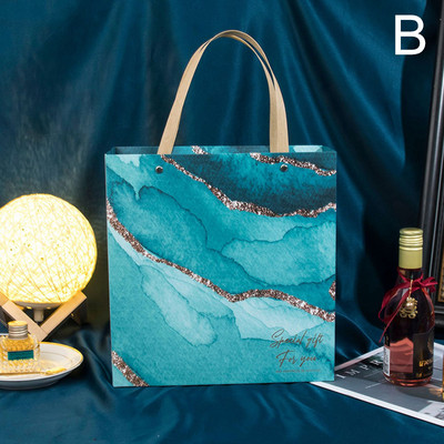 Kingikoti pakendamiskäepide Paberist säilituskott Marmorist prinditud kandekotid pulmakommide kottide poodi riiete hoiupakkekott