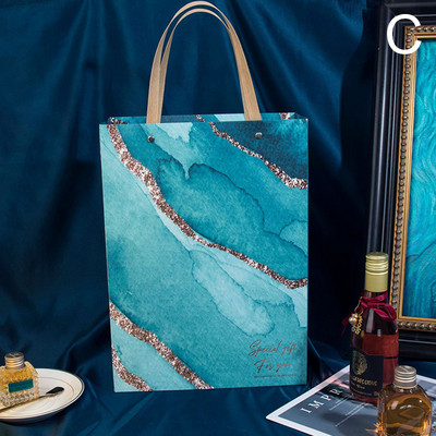 Kingikoti pakendamiskäepide Paberist säilituskott Marmorist prinditud kandekotid pulmakommide kottide poodi riiete hoiupakkekott