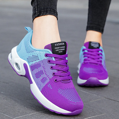 New model sports sneakers made of textile with inscription and laces for women