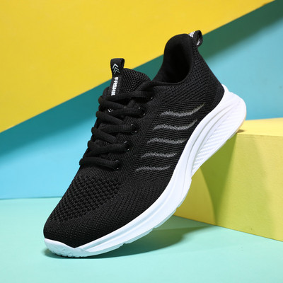 Sportske ženske tenisice s ravnim potplatom i natpisom