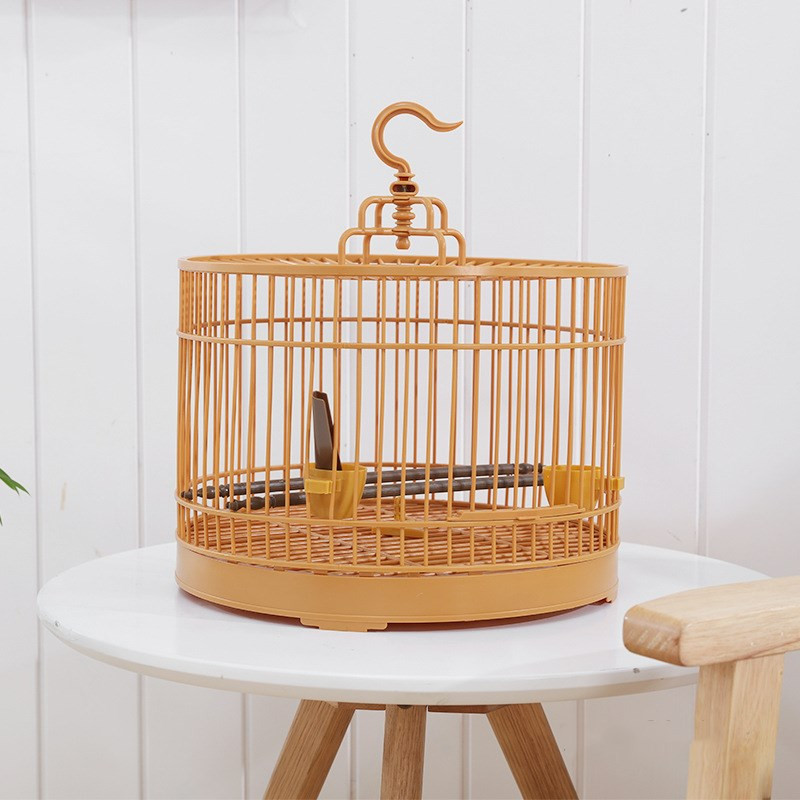 Ümmargune linnupuur Retro plastikust papagoide puurid koos söötjaga Eemaldatav hingav linnupuur Lindude papagoide kasvatamise tarvikud