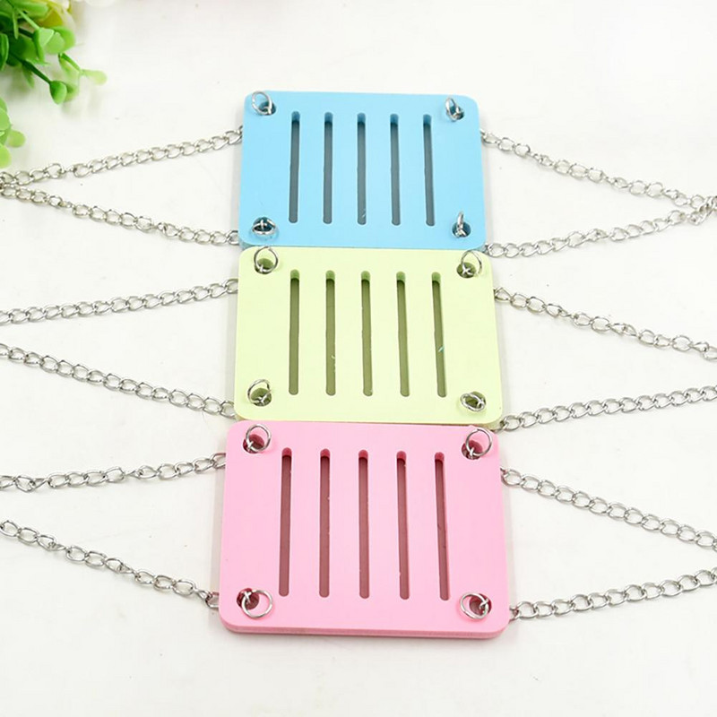 Kāmja krāsainas piekārtas šūpoles mazo dzīvnieku aktivitāšu rotaļlietu būrīša piederumi kāmjiem, pelēm papagaiļiem