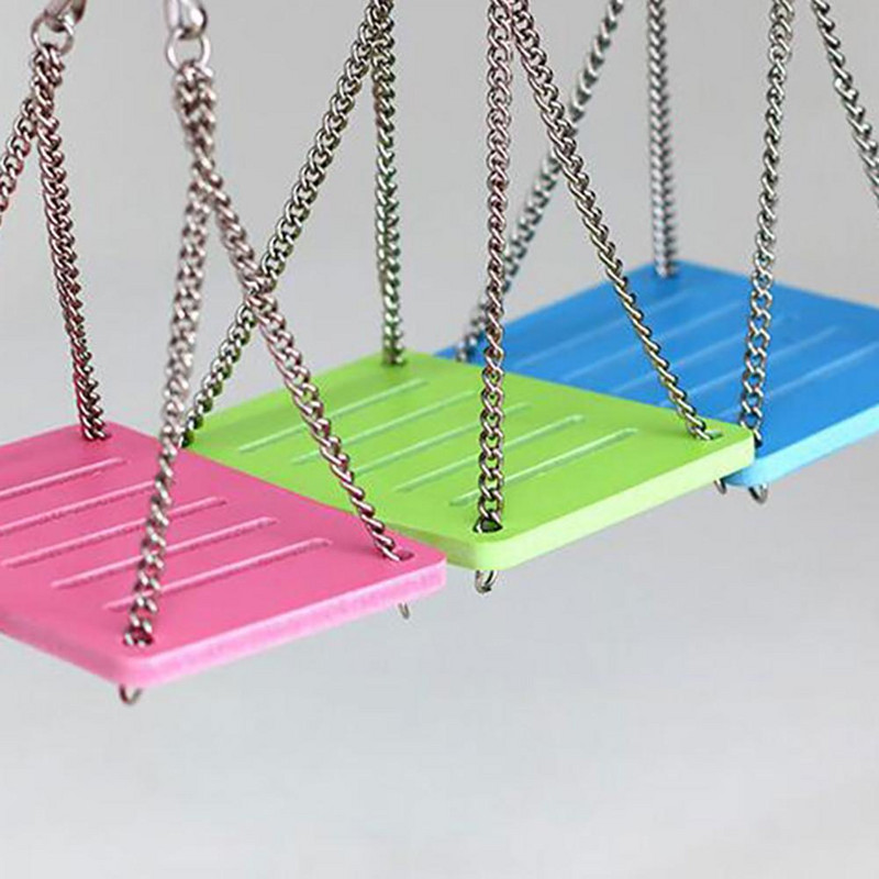 Kāmja krāsainas piekārtas šūpoles mazo dzīvnieku aktivitāšu rotaļlietu būrīša piederumi kāmjiem, pelēm papagaiļiem