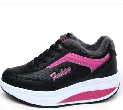 Women`s sneakers with lining and inscription