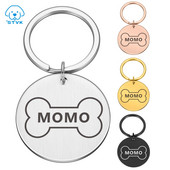 Personalizēta nerūsējošā tērauda gravēšana Mājas suņa identifikācijas zīme Pielāgots numurs Nosaukums Kaķa zīme Apkakles Kauls Nosaukuma plāksnīte Pretnozaudēšanas piekariņi