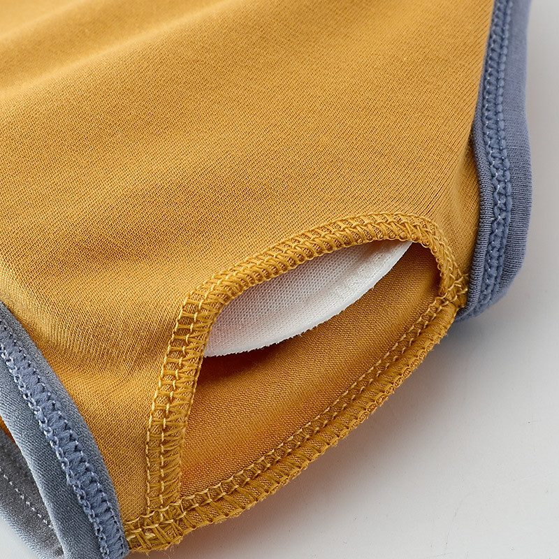 Naiste spordirinnahoidjad Kiiresti kuivavad elastsed polsterdatud jõusaalis jooksvad skeep rinnahoidjad ühevärvilised Fitness Yoga Sport hingavad topid