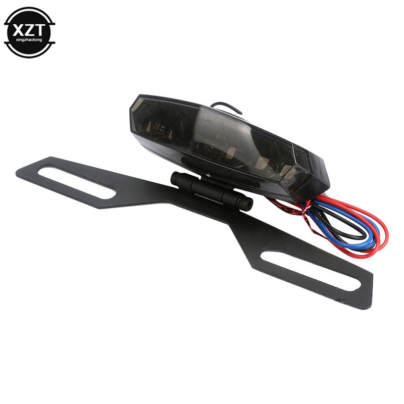 Sulankstomas valstybinio numerio ženklo laikiklis galinio žibinto laikiklis, skirtas keturračio purvo motociklui