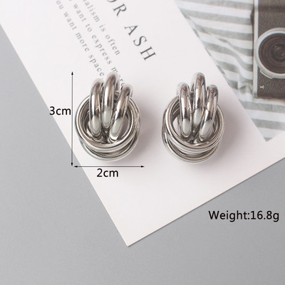 Cercei cu știfturi de metal Twist pentru femei Cercei de culoare aurie cu formă geometrică goală Cercei cu personalitate neobișnuită Trend Brincos