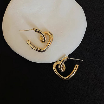 2022 Korea szív arany színű fém geometriai üreges egyszerű formájú fülbevaló női esztétikai ékszerek