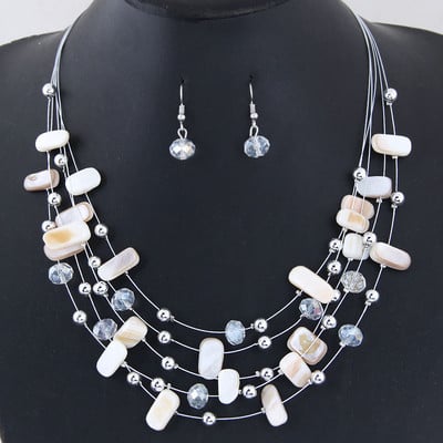 KMVEXO Set de bijuterii cu margele africane boeme pentru femei 2018 Cercei colier multistrat Seturi de bijuterii din carapace de cristal Seturi de nunta cu farmec