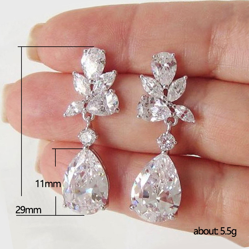 Cercei cu picătură de cristal Huitan cu temperament din zirconiu cubic Bling Bling Cercei pentru femei de înaltă calitate, de culoare argintie, bijuterii la modă