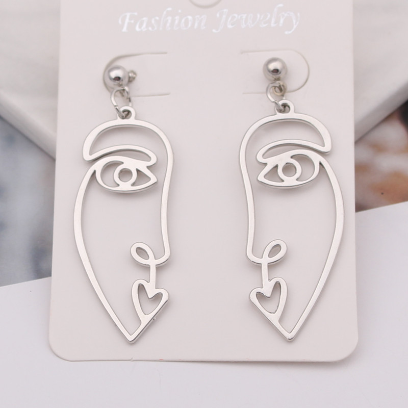 Európai és amerikai személyiség eltúlzott absztrakt arc sziluett fülbevaló üreges arc fülbevaló nőknek nagykereskedés ékszer