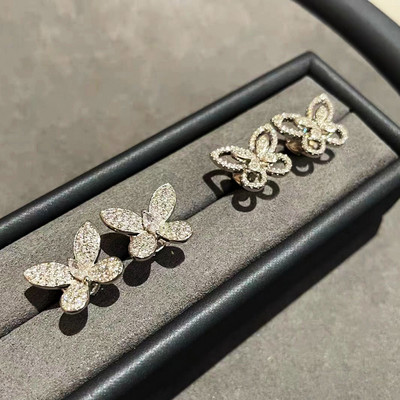 Сладък Bling Циркон камък Сребърен цвят Пеперуда Обеци на шипове за жени Модни бижута Корейски обеци 2022 Нова тенденция