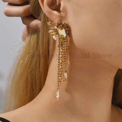 Bohemiški ilgi kutais auskarai, kabantys, blizgus kalnų krištolas, prabangi moteris, geometrinė mada, papuošalai, aksesuarai, brincos