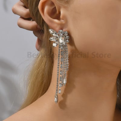 Bohemiški ilgi kutais auskarai, kabantys, blizgus kalnų krištolas, prabangi moteris, geometrinė mada, papuošalai, aksesuarai, brincos