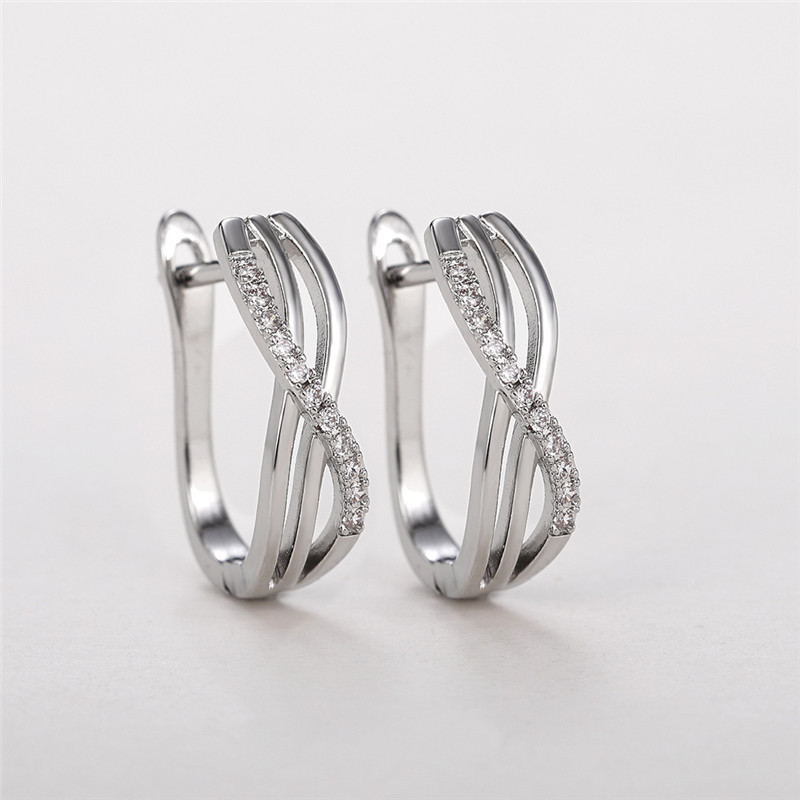 „Huitan Fancy“ sidabrinės spalvos lanko auskarai su krištoliniu CZ akmeniu Naujo dizaino moteriški ausų priedai Universalūs „Statement“ papuošalai