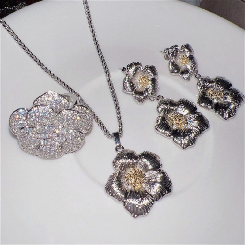 Vintage pitsist kärgstruktuurist karikakra lillega vääriskivist sõrmus värviline vääriskivist tsirkoon laava metallist käevõru kõrvarõngad