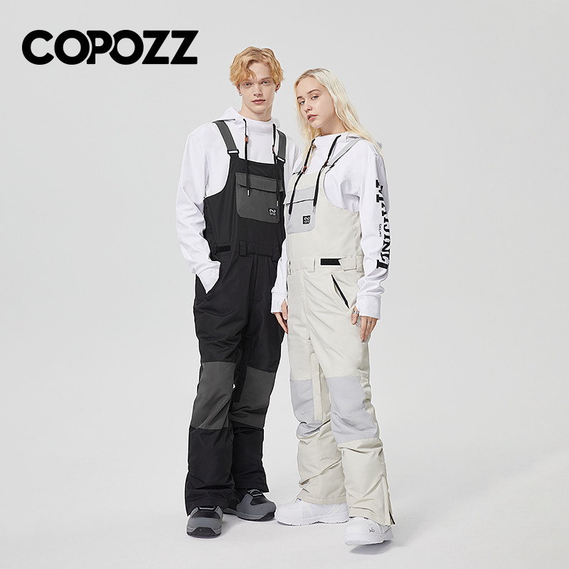 COPOZZ Snowboard stražnje skijaške hlače Vjetrootporne kombinezone kontrastnih boja Skijaške hlače Muškarci Žene Zimska oprema za skijanje na otvorenom Hlače