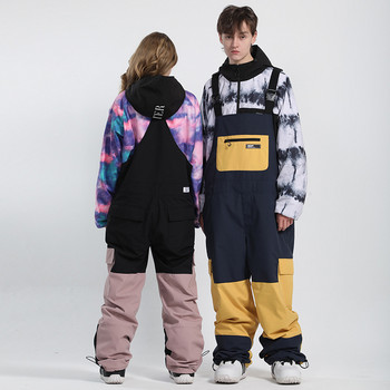 Зимни мъжки дамски еднокомпонентни ски панталони с двойна дъска с каишки Водоустойчиви ски костюми за съвпадащи цветове Еднокомпонентни светещи панталони за сняг